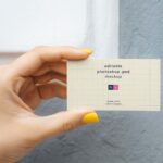 Top View of a Hand Holding a Business Card Mockup