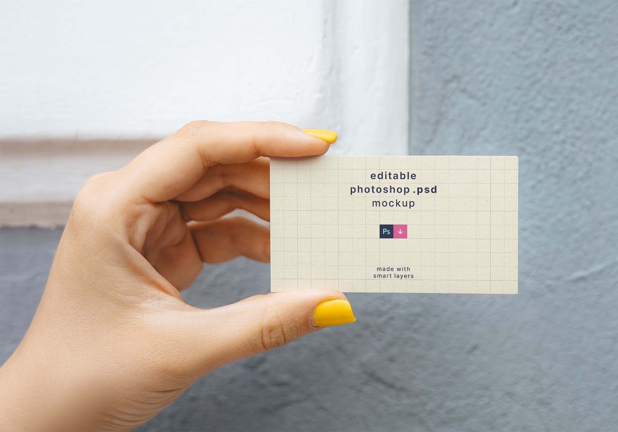 Top View of a Hand Holding a Business Card Mockup FREE PSD
