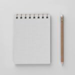 Top View of a Linen Spiral Notebook Mockup