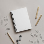 Top View of a Minimal Stationery Paper Notebook Mockup