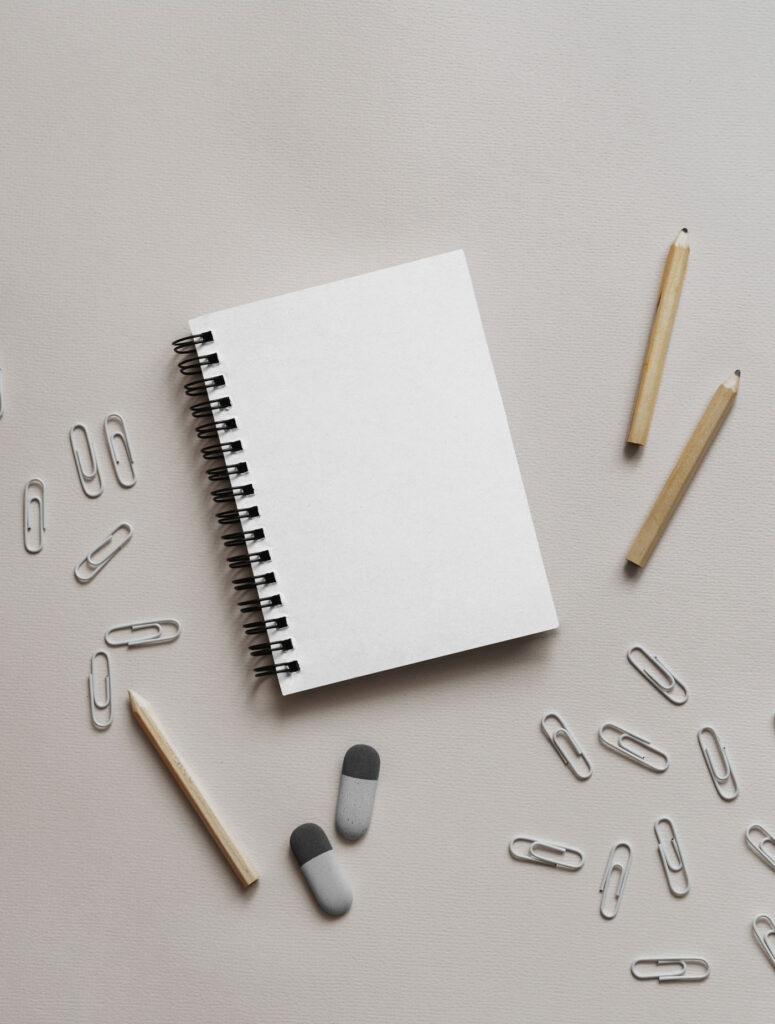 Top View of a Minimal Stationery Paper Notebook Mockup