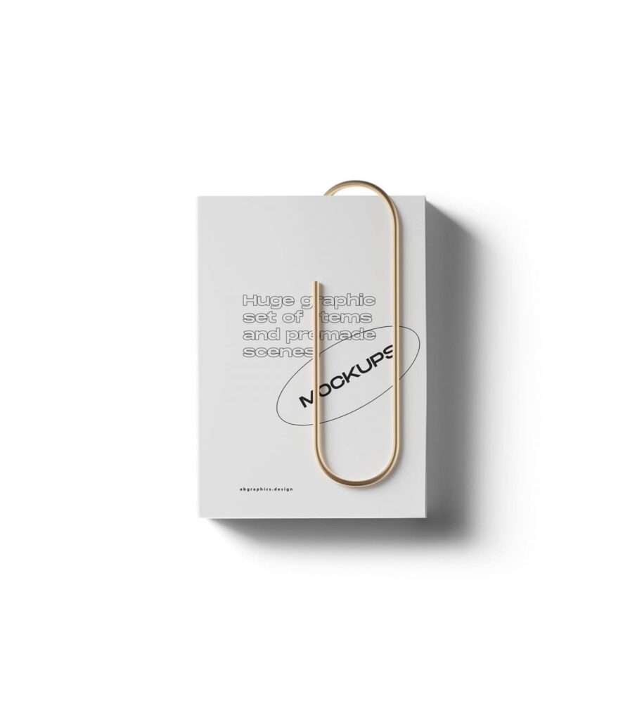 Top View of a Realistic Closed Book with Clip Mockup