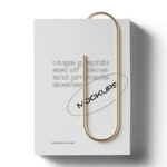 Top View of a Realistic Closed Book with Clip Mockup