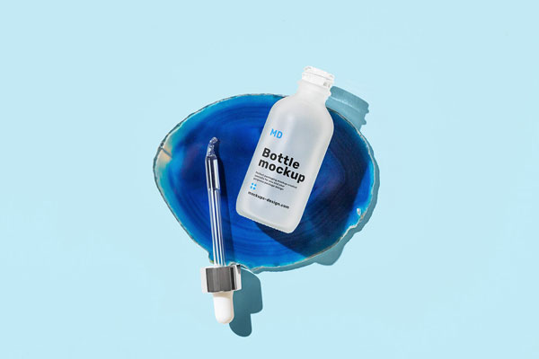 Top View of a Realistic Dropper Bottle Mockup