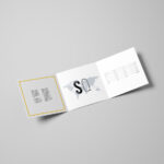 Top View of a Square Tri-Fold Brochure Mockup Set