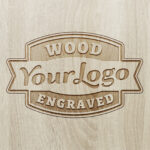 Top View of a Wood Engraved Logo Mockup / Text Effect
