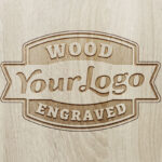 Top View of a Wood Engraved Logo Mockup / Text Effect