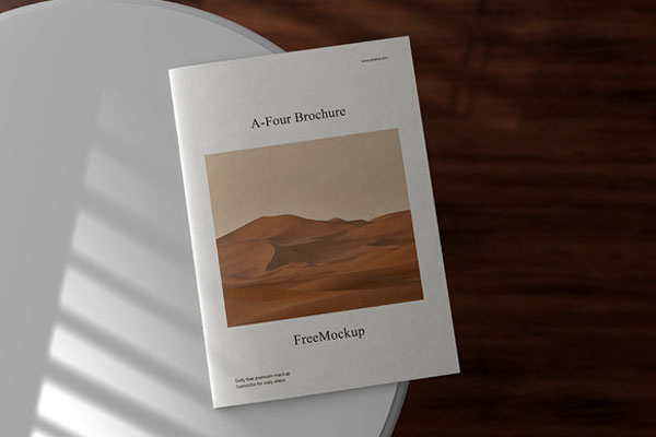 Top View of A4 Brochure Mockup on Rustic Surface