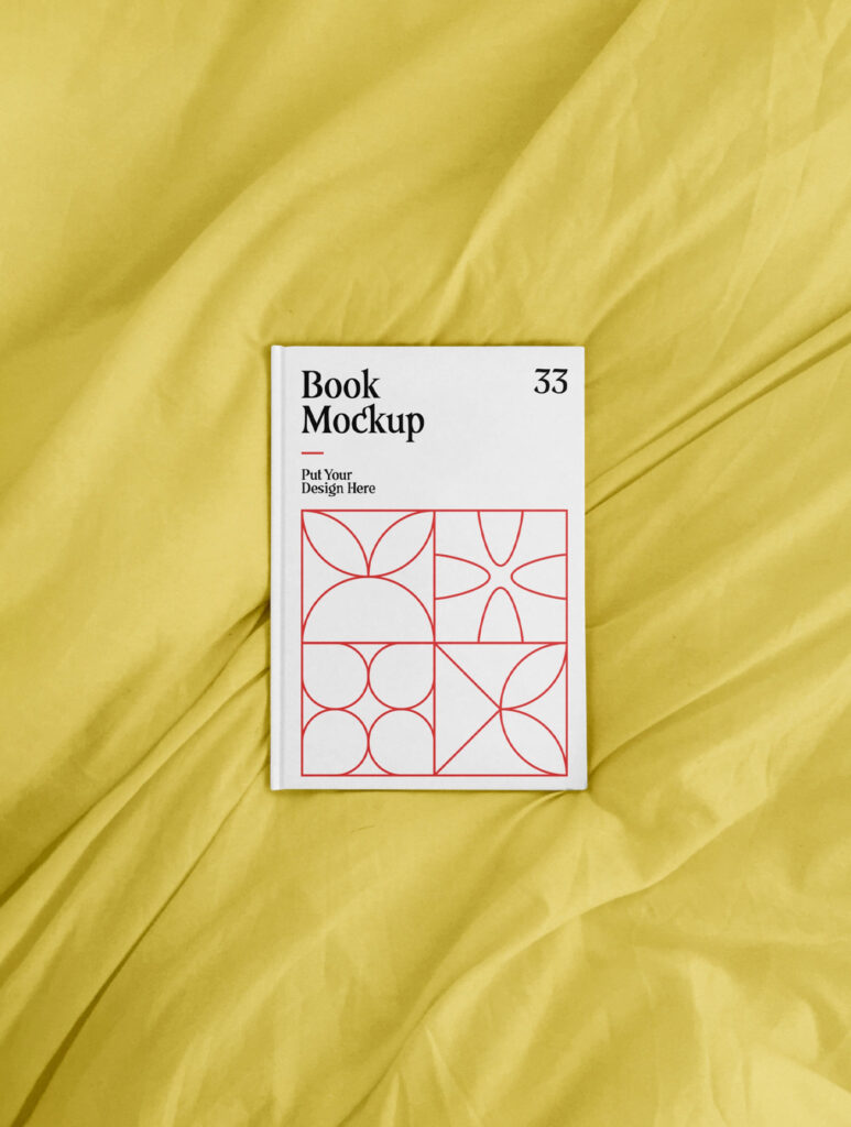 Top View of an A4 Book Hardcover on a Sheet Mockup