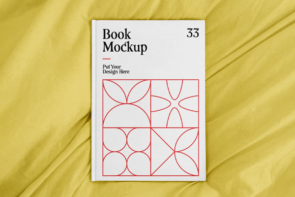 Top View of an A4 Book Hardcover on a Sheet Mockup