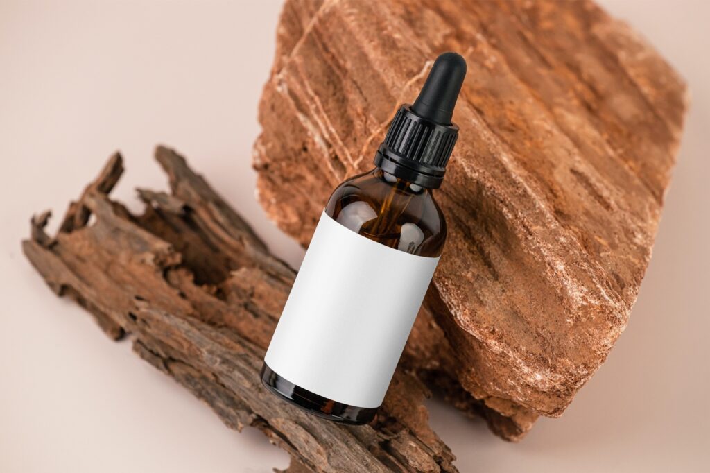Top View of an Amber Dropper Bottle Mockup