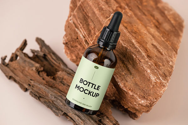 Top View of an Amber Dropper Bottle Mockup