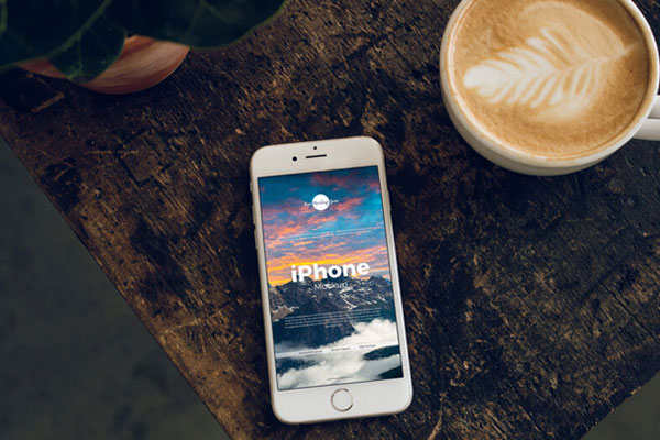 Top View of an iPhone with Coffee Cup Mockup