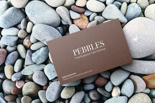 Top View of Business Card Mockup on Pebbles