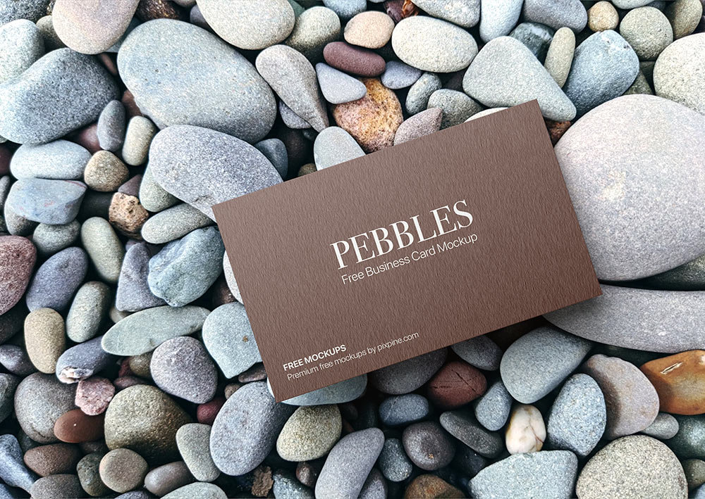 Top View of Business Card Mockup on Pebbles