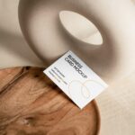 Top View of Business Card Mockup on Wooden Plate