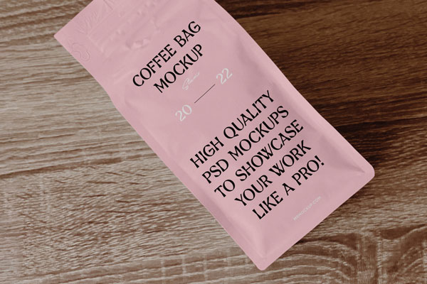 Top View of Coffee Bag Mockup on Wooden Table