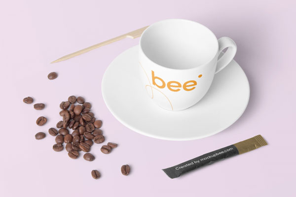 Top View of Coffee Cup Mockup Featuring Spread Coffee Beans