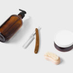 Top View of Dispenser Bottle Mockup Featuring Jar and Razor