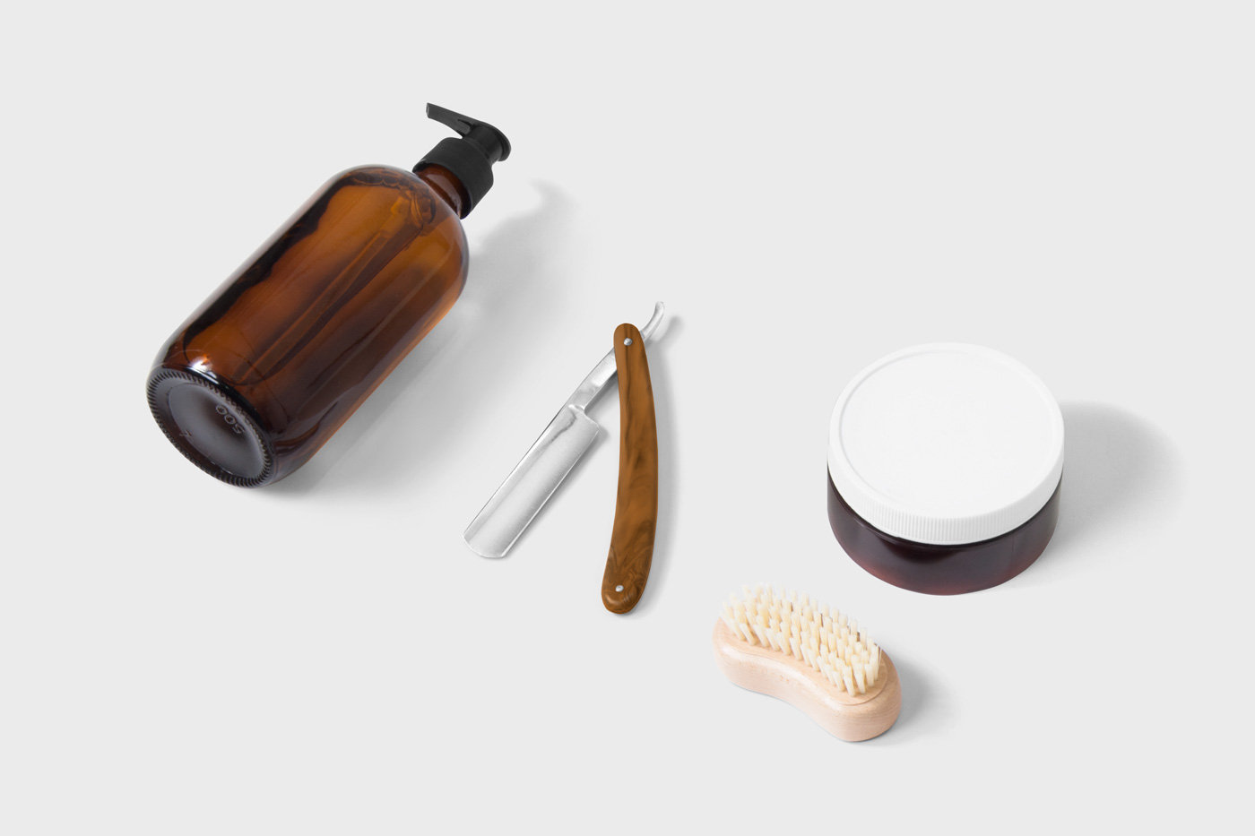 Top View of Dispenser Bottle Mockup Featuring Jar and Razor FREE PSD