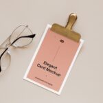 Top View of Elegant Card Mockup Featuring Clip and Glasses
