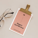 Top View of Elegant Card Mockup Featuring Clip and Glasses