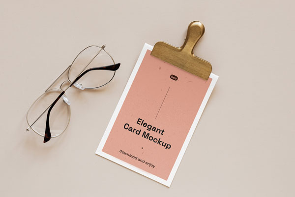 Top View of Elegant Card Mockup Featuring Clip and Glasses