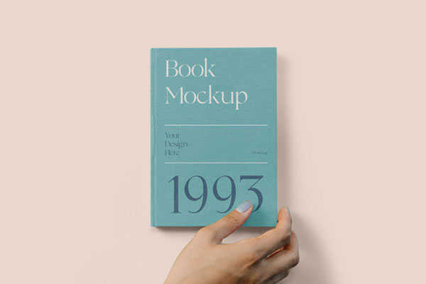 Top View of Hard Cover Book Mockup with Hand
