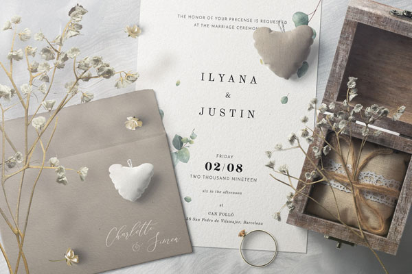 Top View of Invitation Card Mockup with Plush Hearts