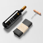 Top View of Lying Wine Bottle Mockup with Dishcloth
