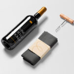 Top View of Lying Wine Bottle Mockup with Dishcloth