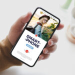 Top View of Man Holding Smartphone Mockup
