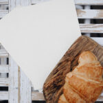 Top View of Menu Cards Mockup with Croissant