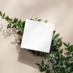 Top View of Mini Square Card Mockup on Plant