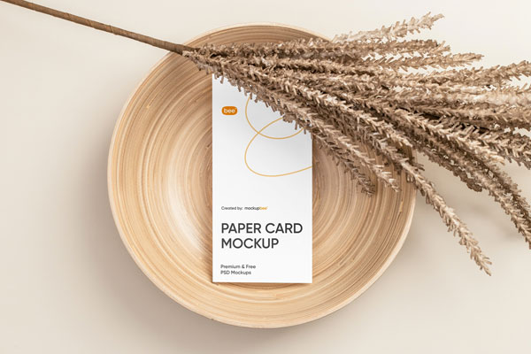 Top View of Modern Vertical Paper Card Mockup on Plate