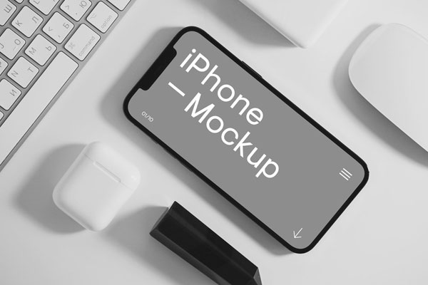 Top View of Neat iPhone Mockup with Accessories