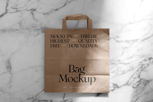 Top View of Paper Shopping Bag Mockup on Marble