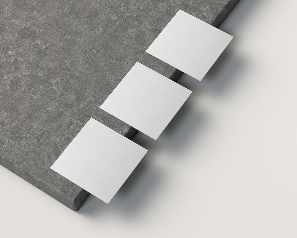 Top View of Square Business Card Mockup on Cement Block