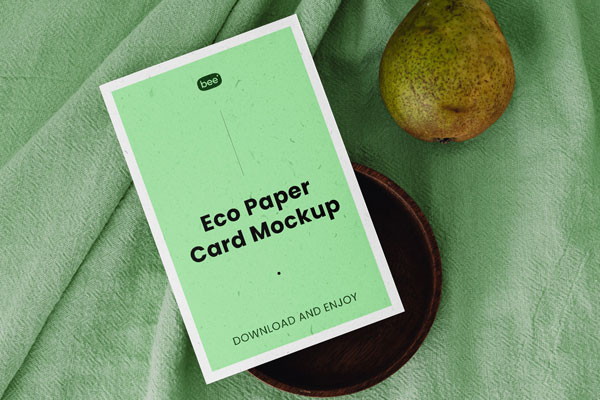 Top View of Vertical Card Mockup on Wooden Plate