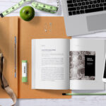 Top View Open Book Mockup Scene with Smartphone, and Plant