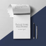 Top View Open Ringed Notepad Mockup with Pencil and Pen