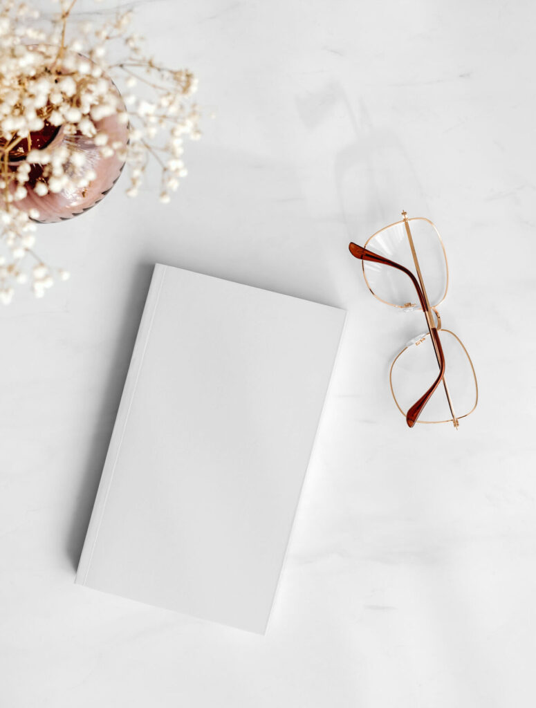 Top View Realistic Notebook with Glasses Mockup