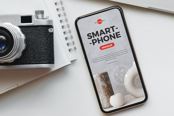 Top View Smartphone Screen Mockup on Desk with a Camera