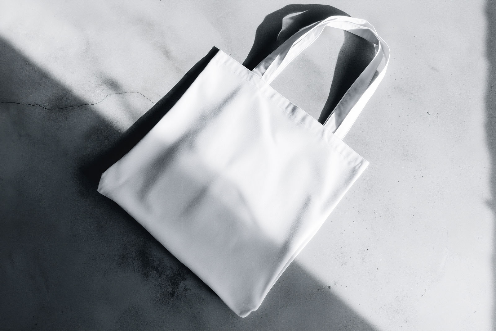 Free Tote Bag Mockup on Concrete Floor PSD Template