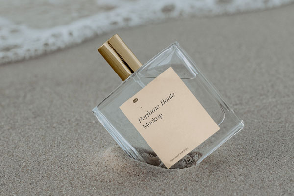 Transparent Perfume Bottle with Label Mockup in Beach
