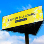 Triangle 3 Sided Single Stand Billboard in Blue Sky Mockup
