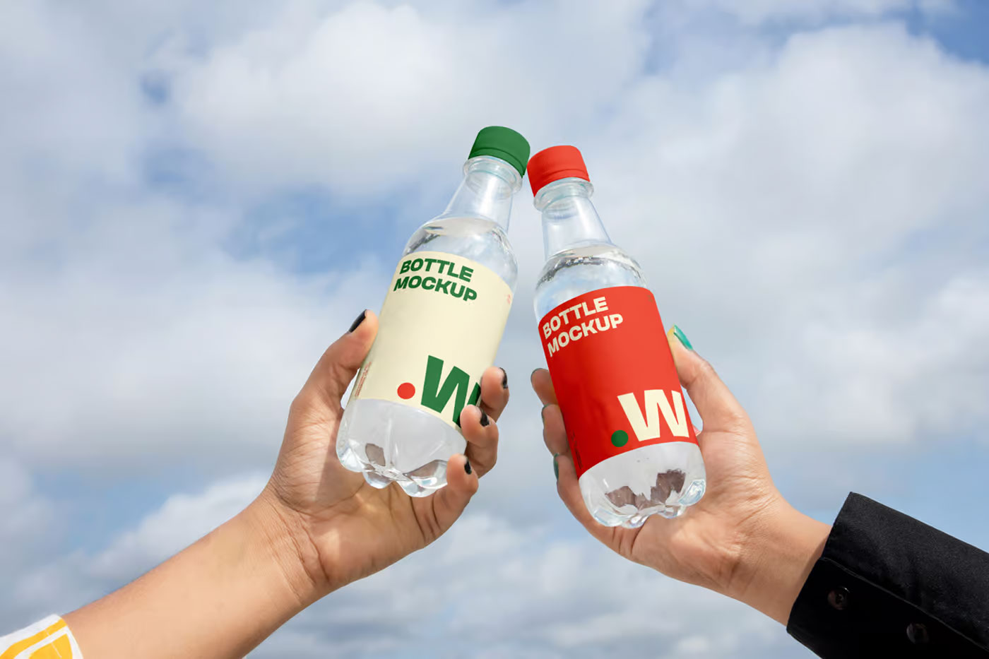 Free Two Bottle in Hand Mockups PSD Template