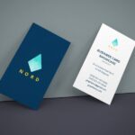 Two Business Cards Leaning Against The Wall Mockup