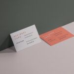 Two Business Cards Mockup Leaning Against Wall and Lying Down