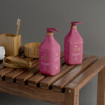 Two Cosmetic Pump Bottles on Wooden Table Mockup